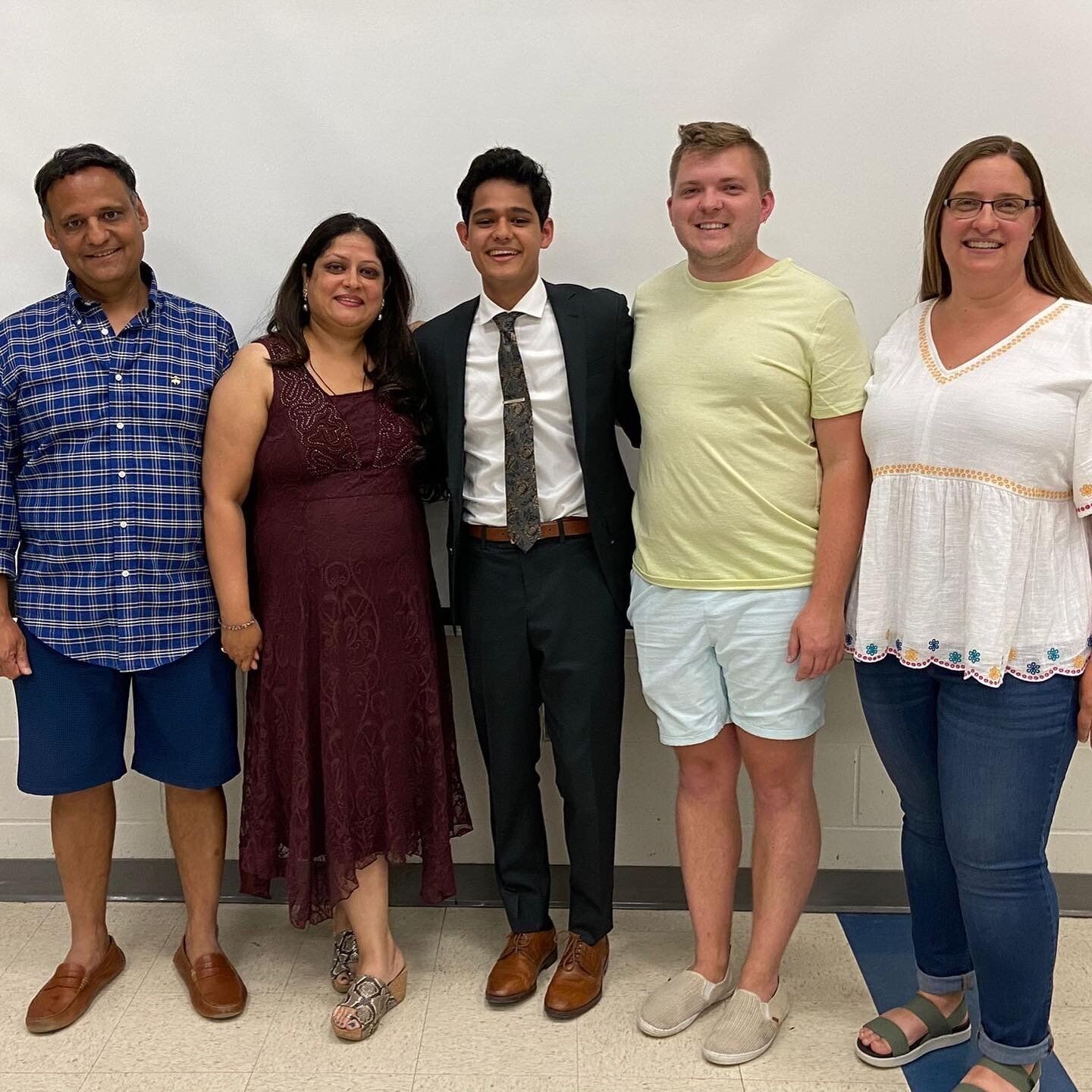 Pranay Mathur with parents and coaches